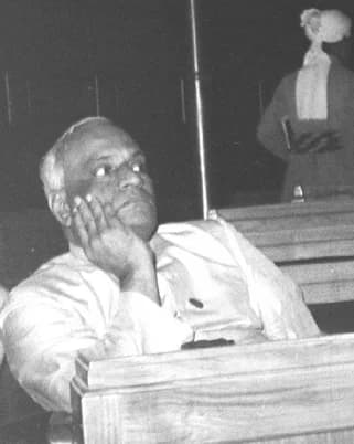V. V. Giri seated with his hand against his cheek, in a black-and-white photograph from 1947