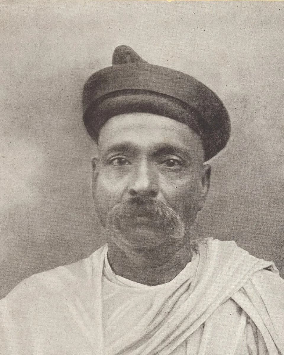 Bal Gangadhar Tilak in a round cap and shawl