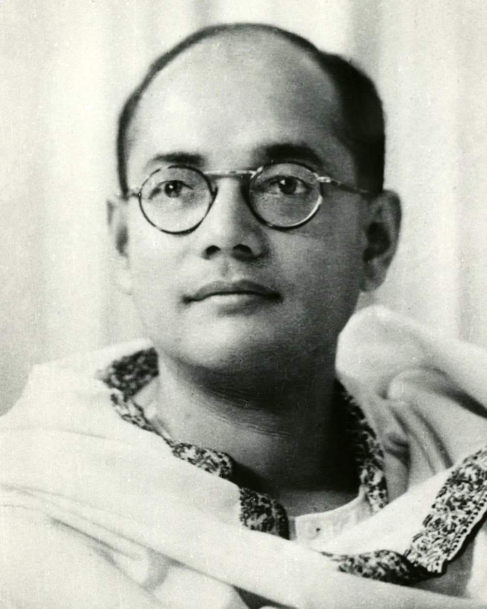 Subhas Chandra Bose in round glasses and a shawl